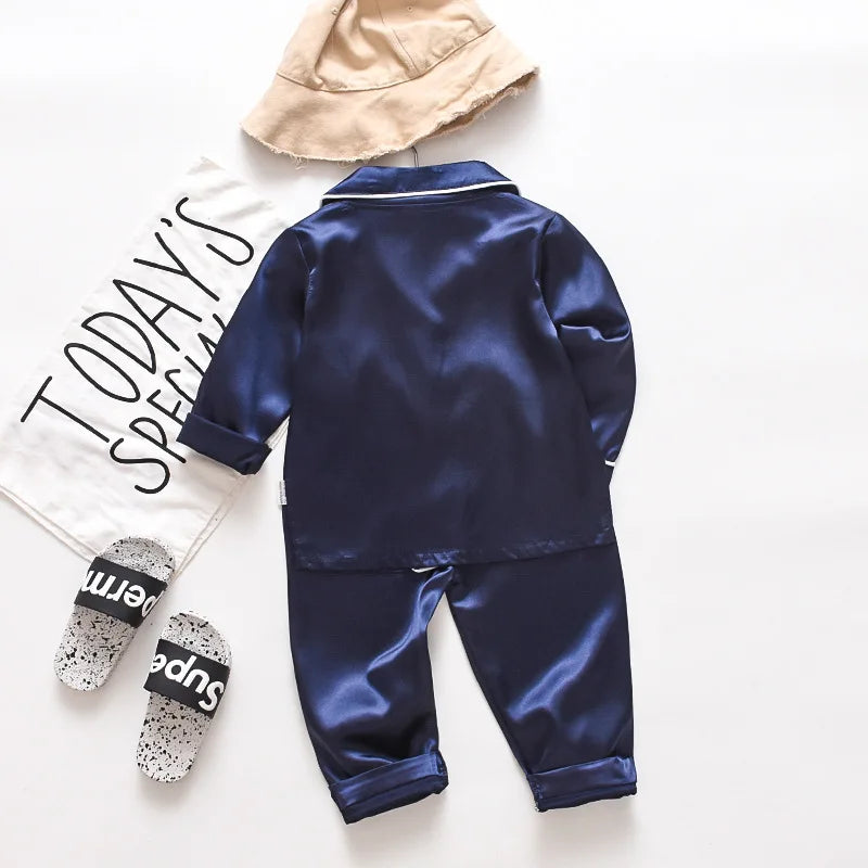 Korean version of childrens pajamas set silk satin long sleeve top+trousers two -piece male baby girl cartoon solid color set - TiniLoom