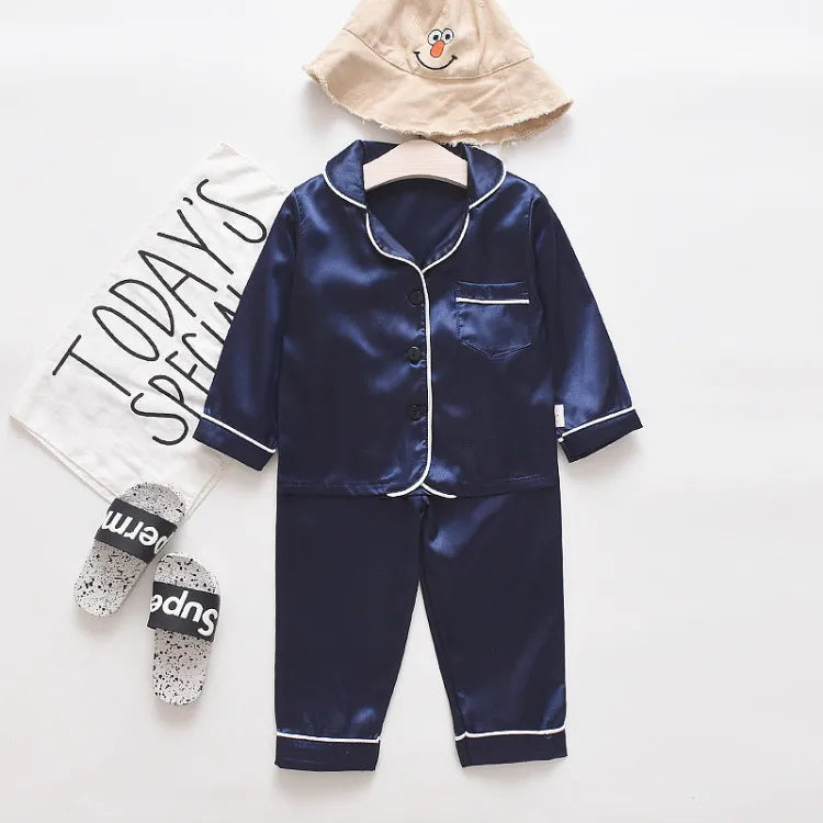 Korean version of childrens pajamas set silk satin long sleeve top+trousers two -piece male baby girl cartoon solid color set - TiniLoom