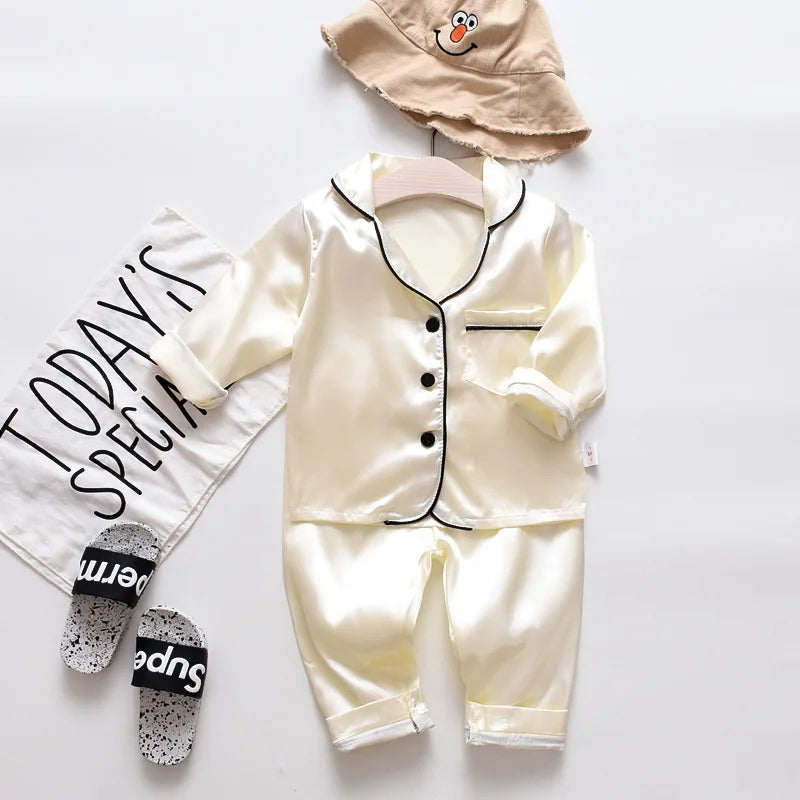 Korean version of childrens pajamas set silk satin long sleeve top+trousers two -piece male baby girl cartoon solid color set - TiniLoom