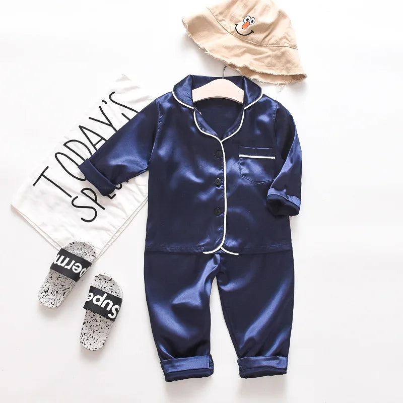 Korean version of childrens pajamas set silk satin long sleeve top+trousers two -piece male baby girl cartoon solid color set - TiniLoom